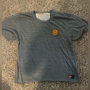 Aviator nation smiley face tee-shirt! In great condition barely worn.